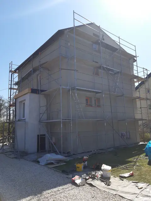 Realizacja Econord - elewacja domu jednorodzinnego po termomodernizacji (25)