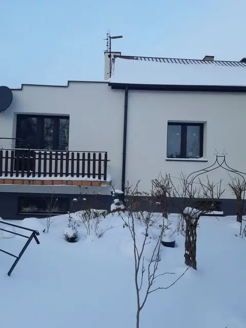 Realizacja Econord - elewacja domu jednorodzinnego po termomodernizacji (33)